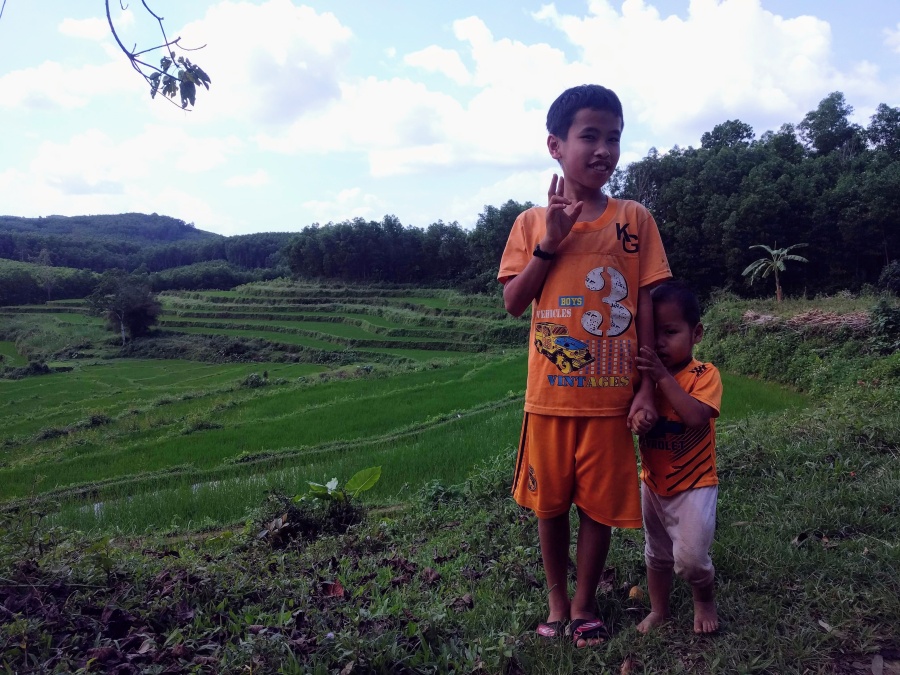 Kids near a rice paddy on a detour between Quang Ngai and Da Nang