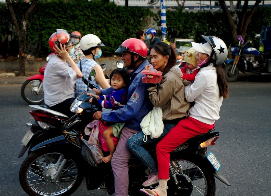 A Family of Five on a Scooter in Saigon